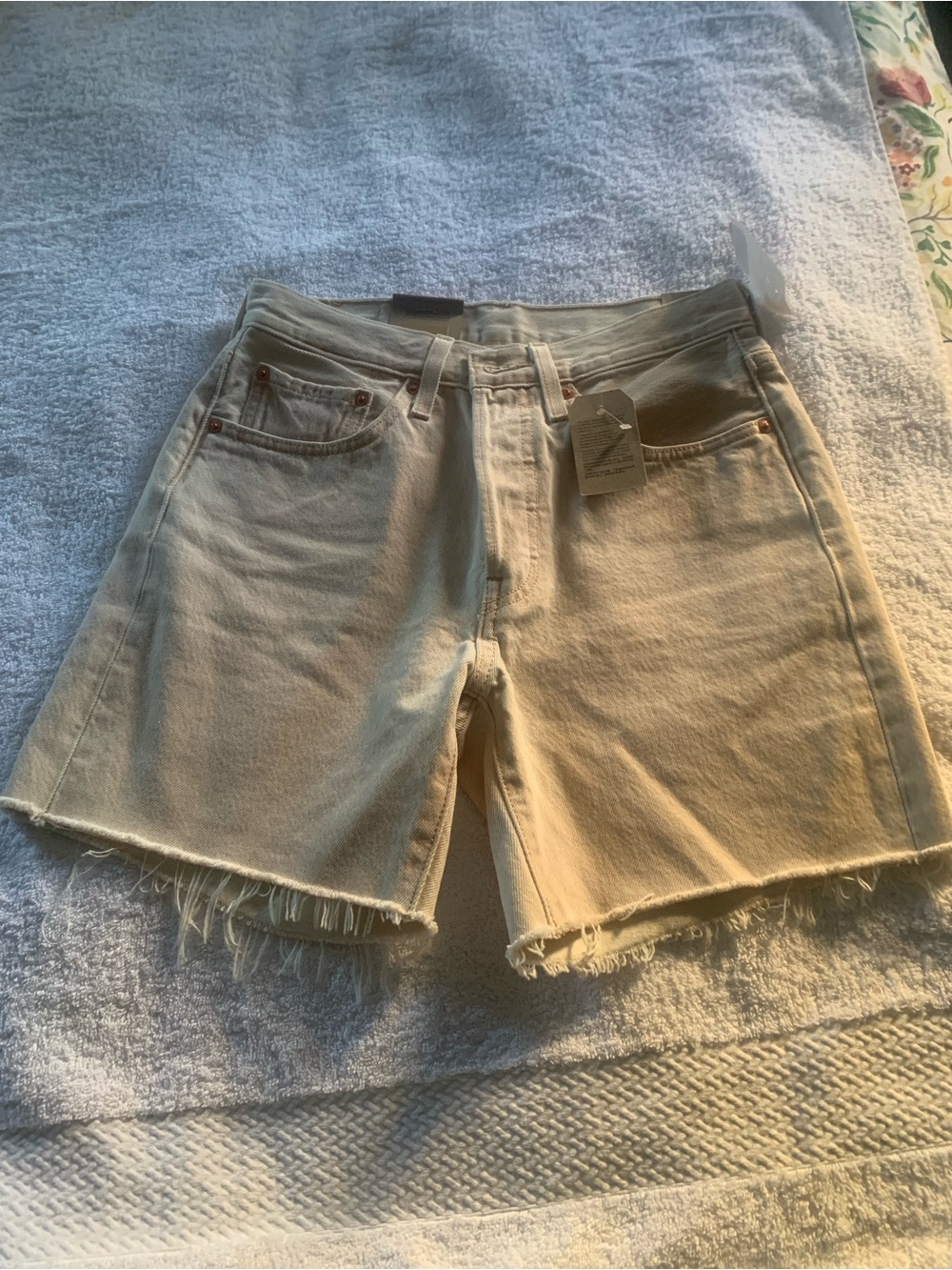 Levi's Cream Cutoff Denim Shorts